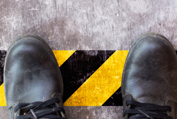 Shoes crossing a hazard line